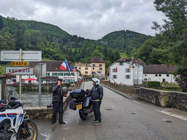 Two damp riders on the French/Swiss border