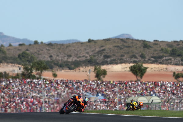 Brad Binder ahead of Luca Marini, 2022 Valencian Grand Prix. - Gold and Goose