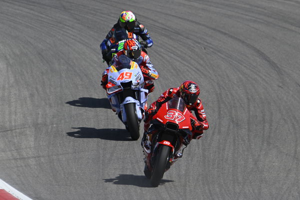 Augusto Fernandez, Fabio Di Giannantonio, Franco Morbidelli, 2023 MotoGP Portuguese Grand Prix. - Gold and Goose