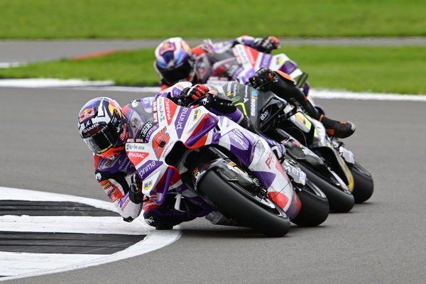 Johann Zarco leads Luca Marini, Jorge Martin, 2023 MotoGP British Grand Prix. - Gold and Goose