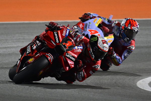 Francesco Bagnaia, Fabio Di Giannantonio, 2023 MotoGP Qatar Grand Prix. - Gold and Goose