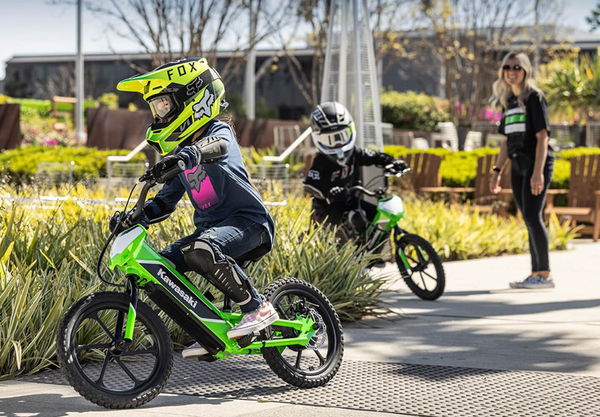 Kawasaki Elektrode being ridden on pavement. - Kawasaki