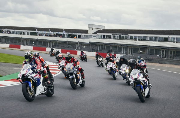 John McGuinness leads a parade of Honda Fireblades