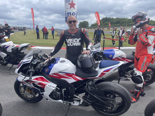 Toad Hancocks from Visordown next to the 2022 Honda CBR1000RR-R SP 30th Annivesary edition