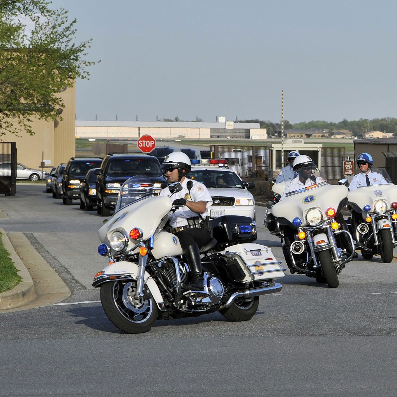 A1C Perry Aston, Public domain, via Wikimedia Commons - A file image of a Police Motorcade