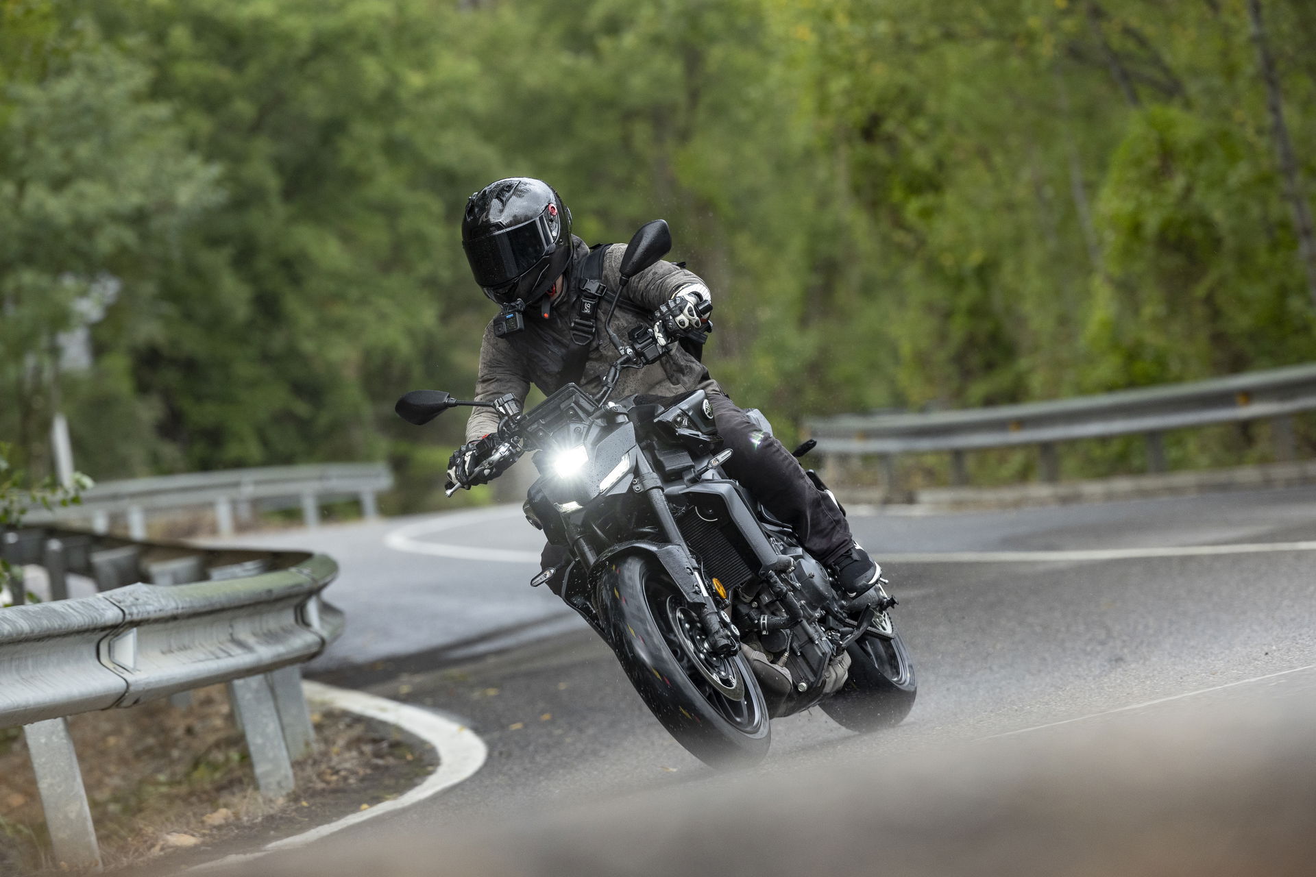 A Yamaha MT-09 Y-AMT being ridden in the rain