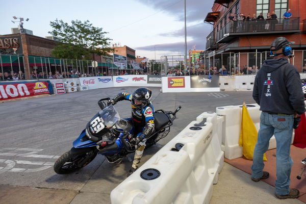 A Triumph Tiger 1200 racing on the streets