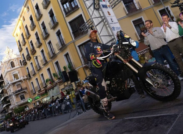 Santosh on the Himalayan 450 crossing the finishing line