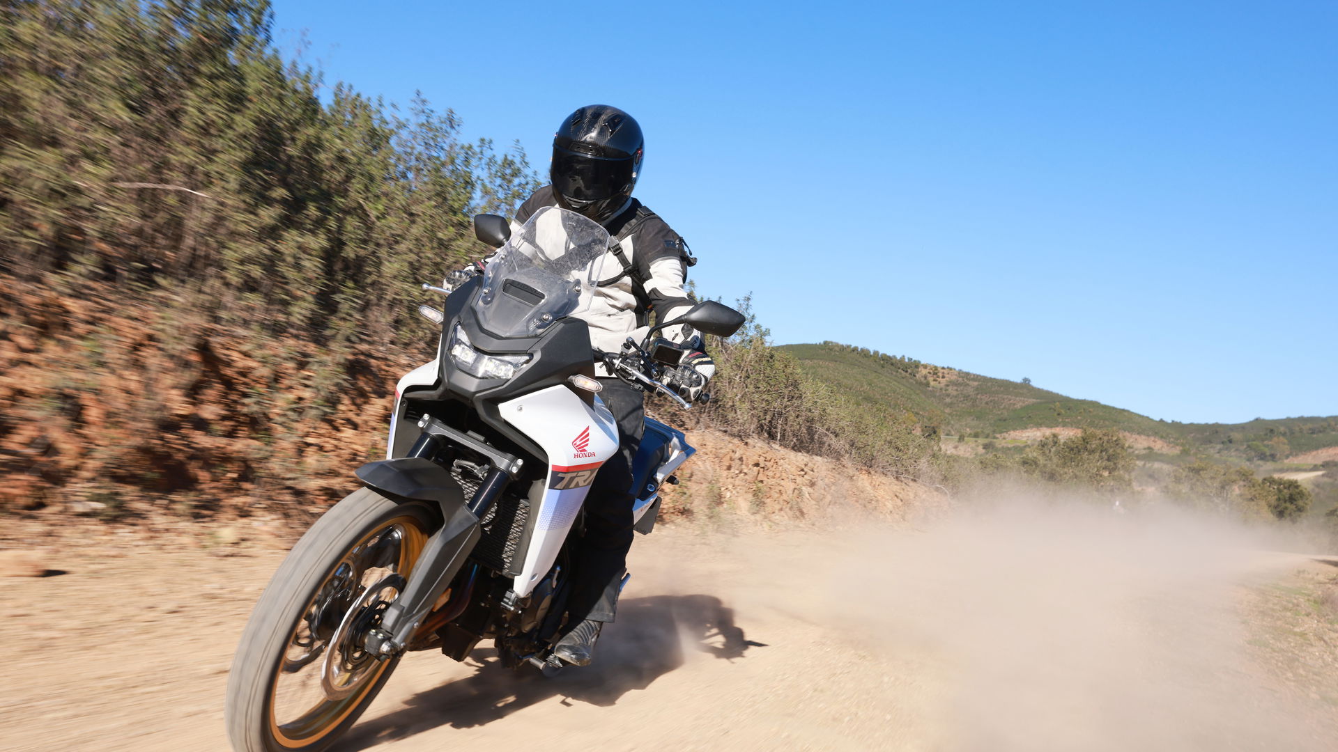 The 2025 Honda XL750 Transalp being ridden off-road