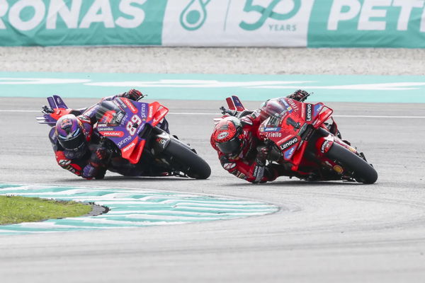 Bagnaia being chased by Martin in the 2024 Malaysian MotoGP round