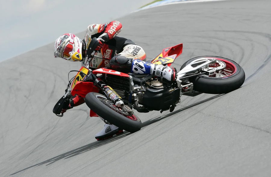 Christian Iddon riding a race-prepped supermoto at Donington Park