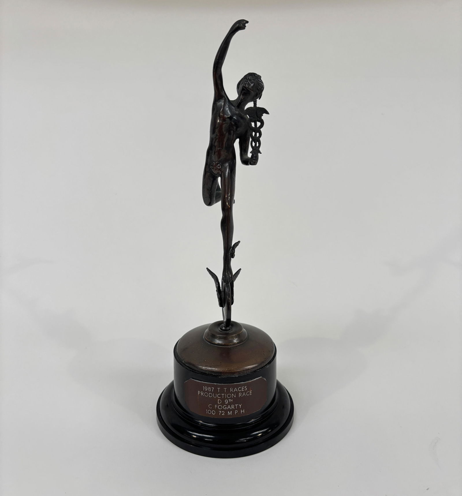 A Bronze TT replica trophy awarded to Carl Fogarty