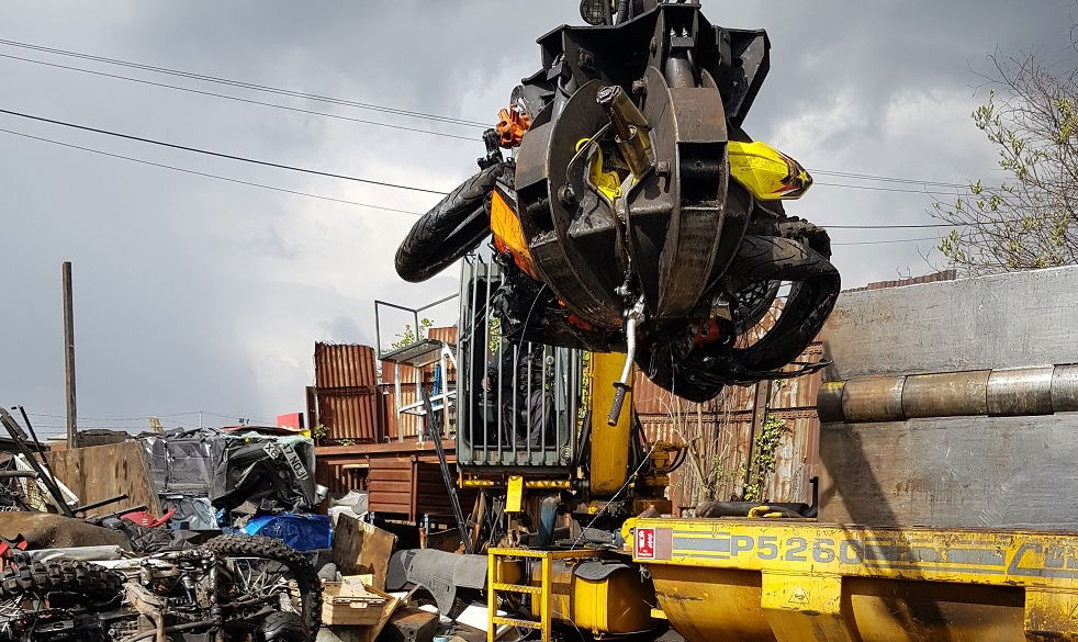 Nuisance motorcycles being crushed