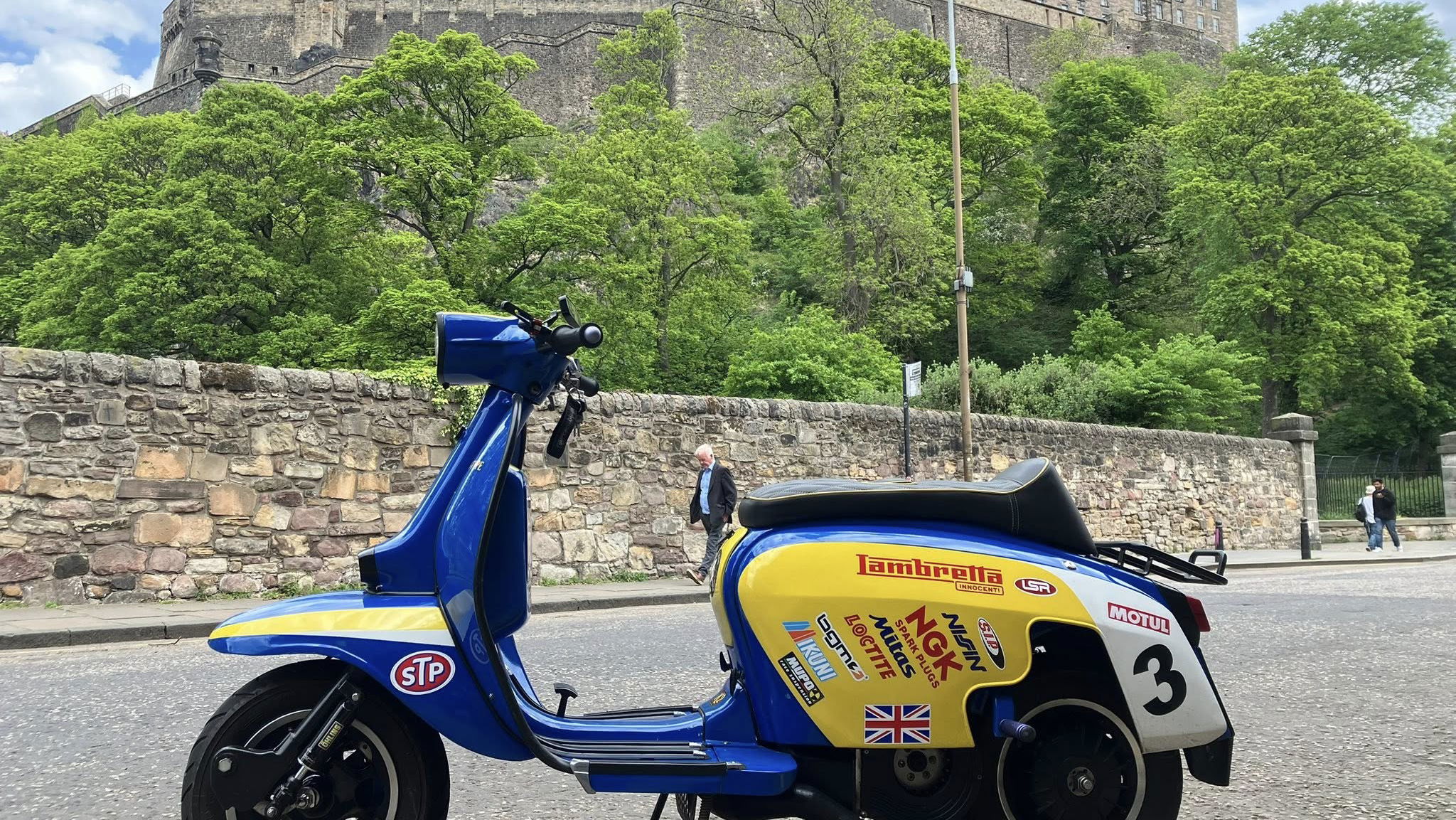 Lambretta scooter in front of castle