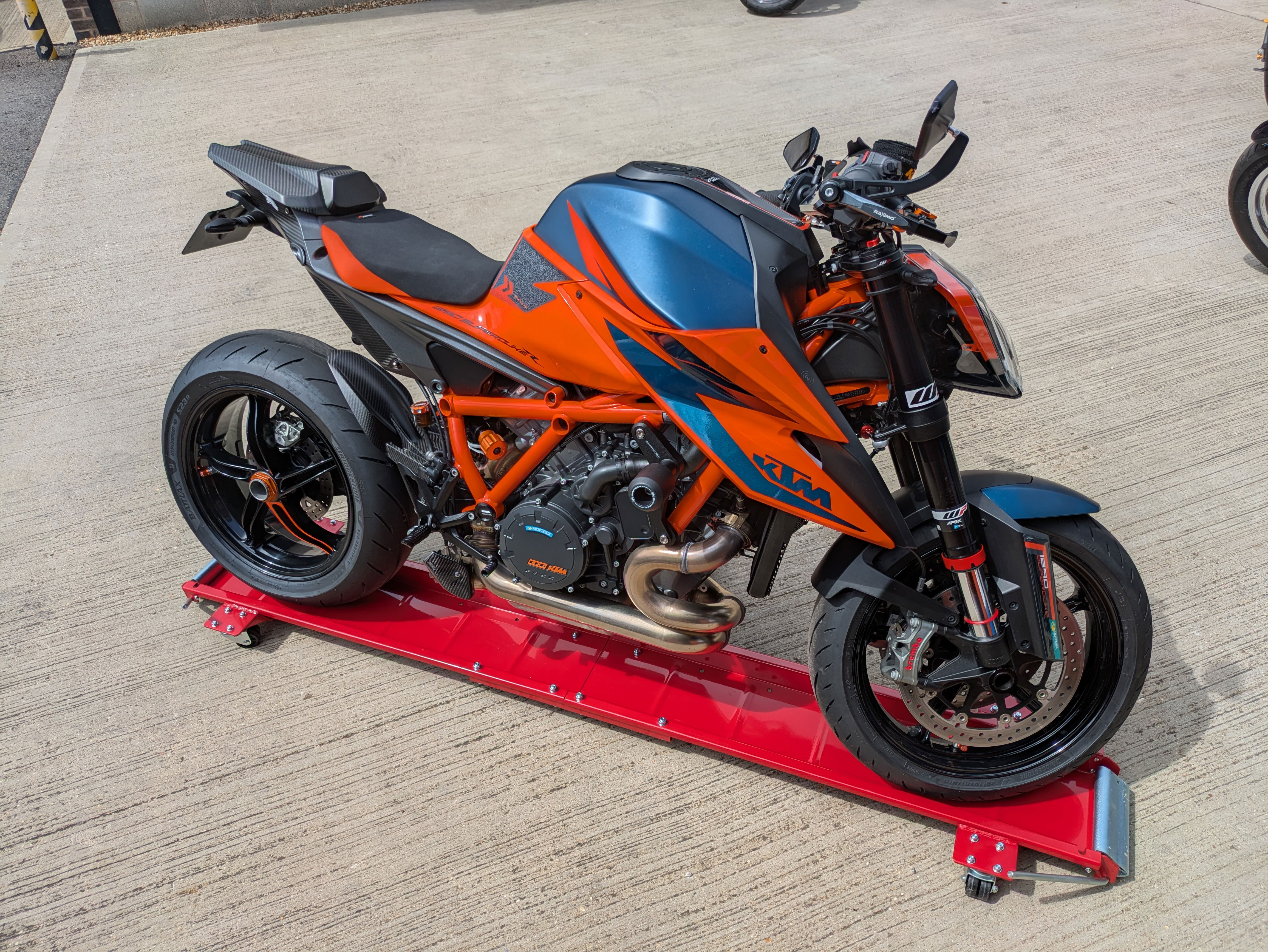 A KTM 1390 Super Duke resting on the Clarke MCD1 Motorcycle Dolly