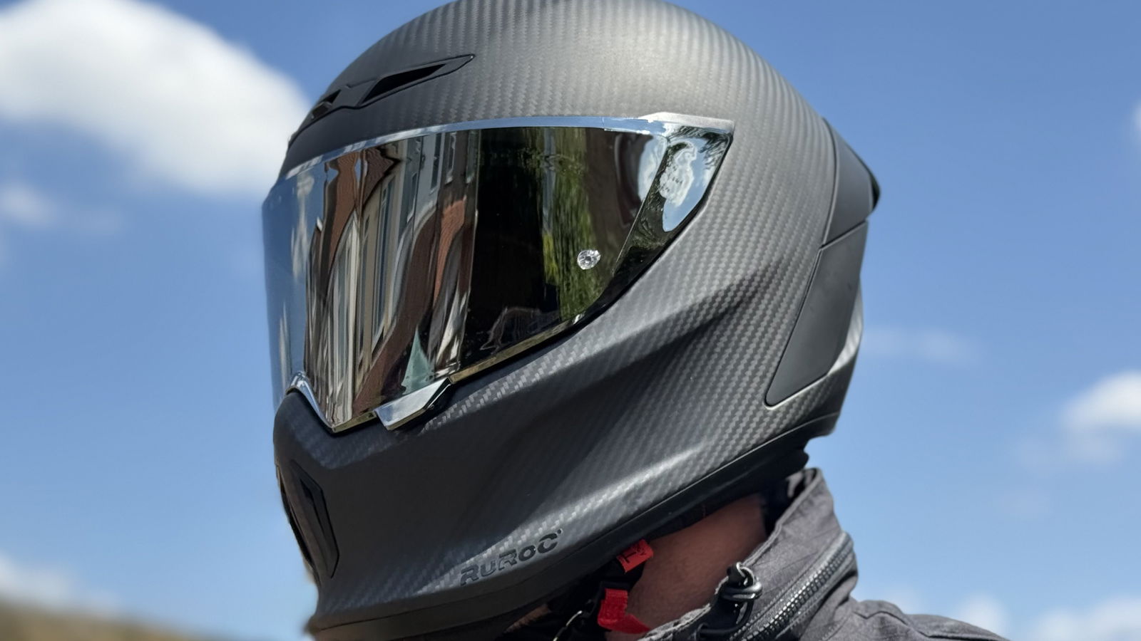 The Ruroc Eox Raw Carbon Motorcycle Helmet
