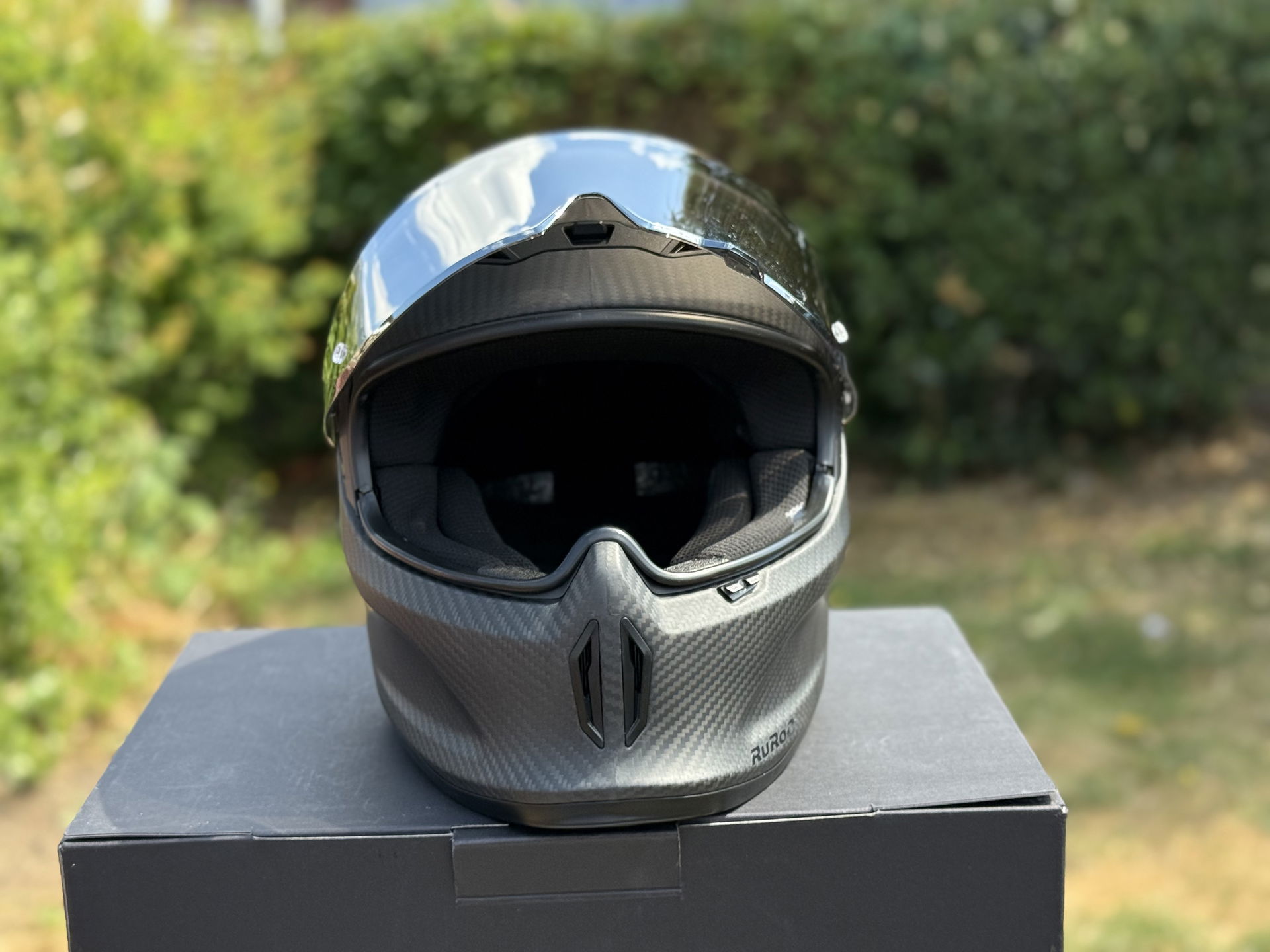 The Ruroc Eox Raw Carbon Motorcycle Helmet