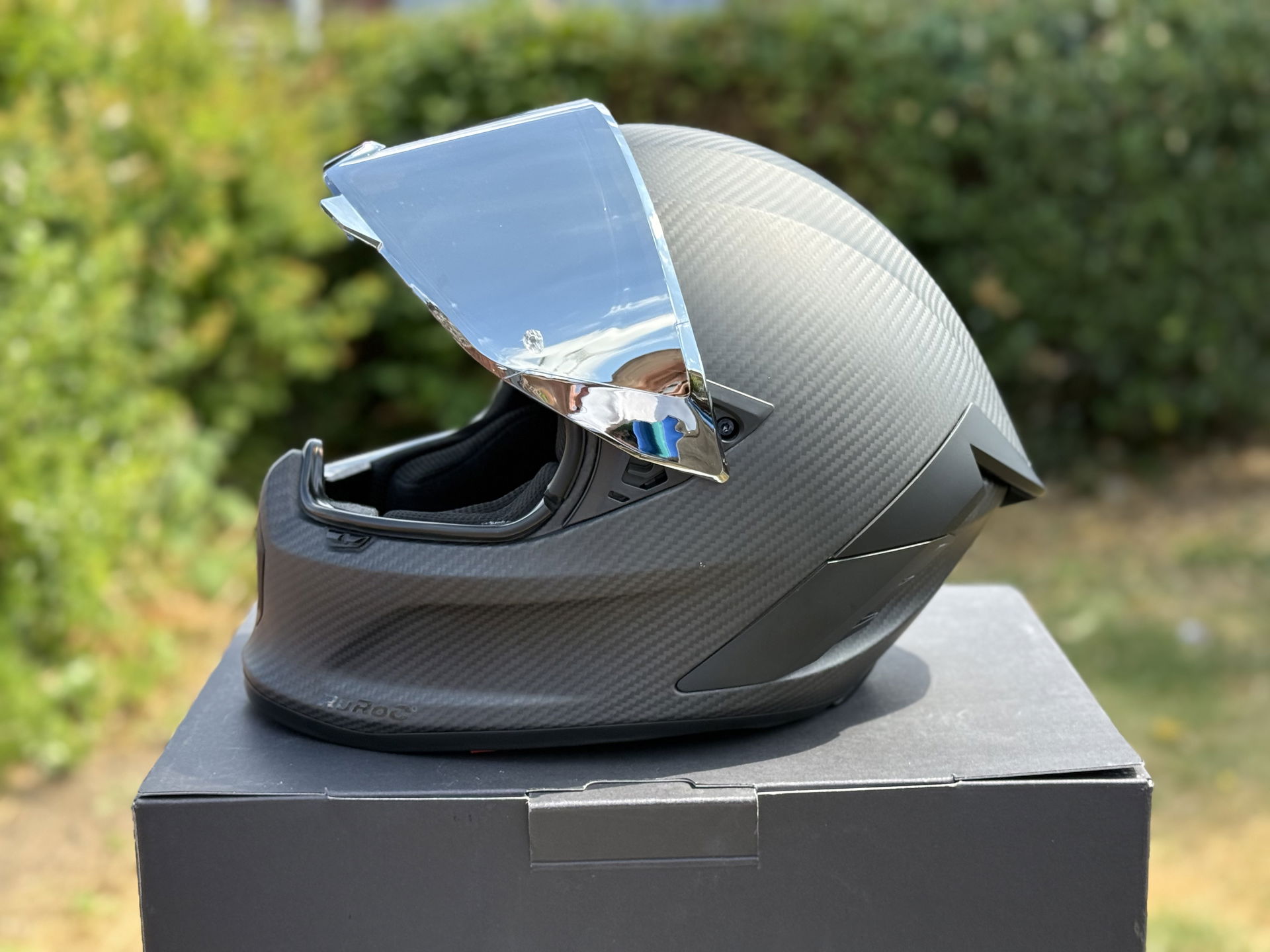 The Ruroc Eox Raw Carbon Motorcycle Helmet