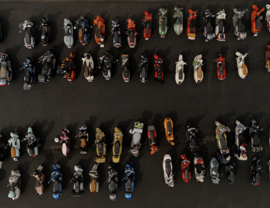Line-up of Vespa scooters at World Days event. Credit - Vespa