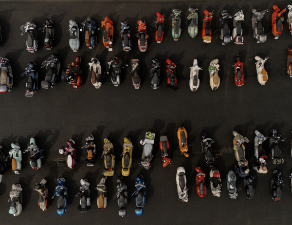 Line-up of Vespa scooters at World Days event. Credit - Vespa