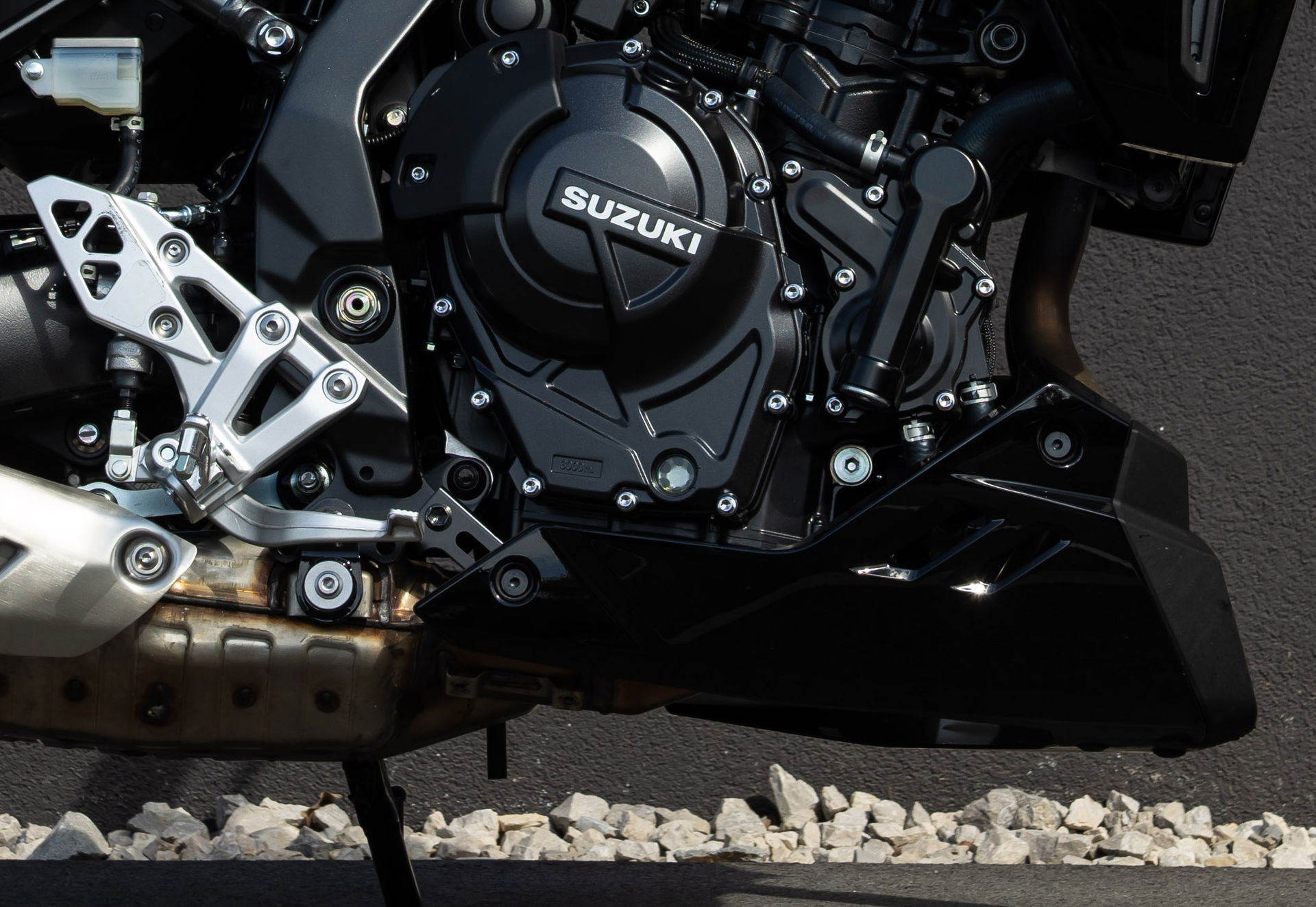 The belly pan which is specific to the GSX-8TT