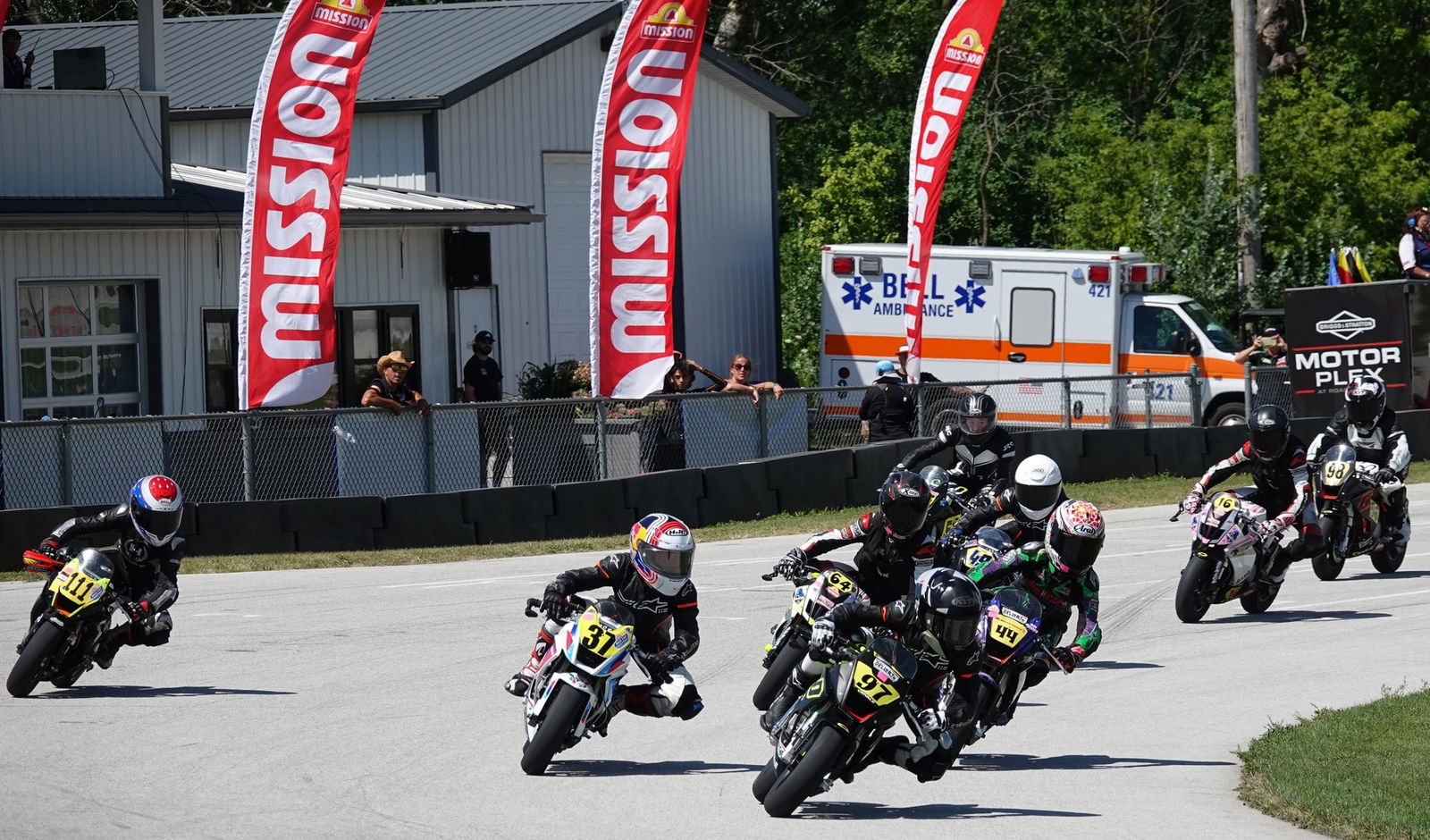 A MiniGP grid heading into a turn. Photo Credit - Larry Lawrence
