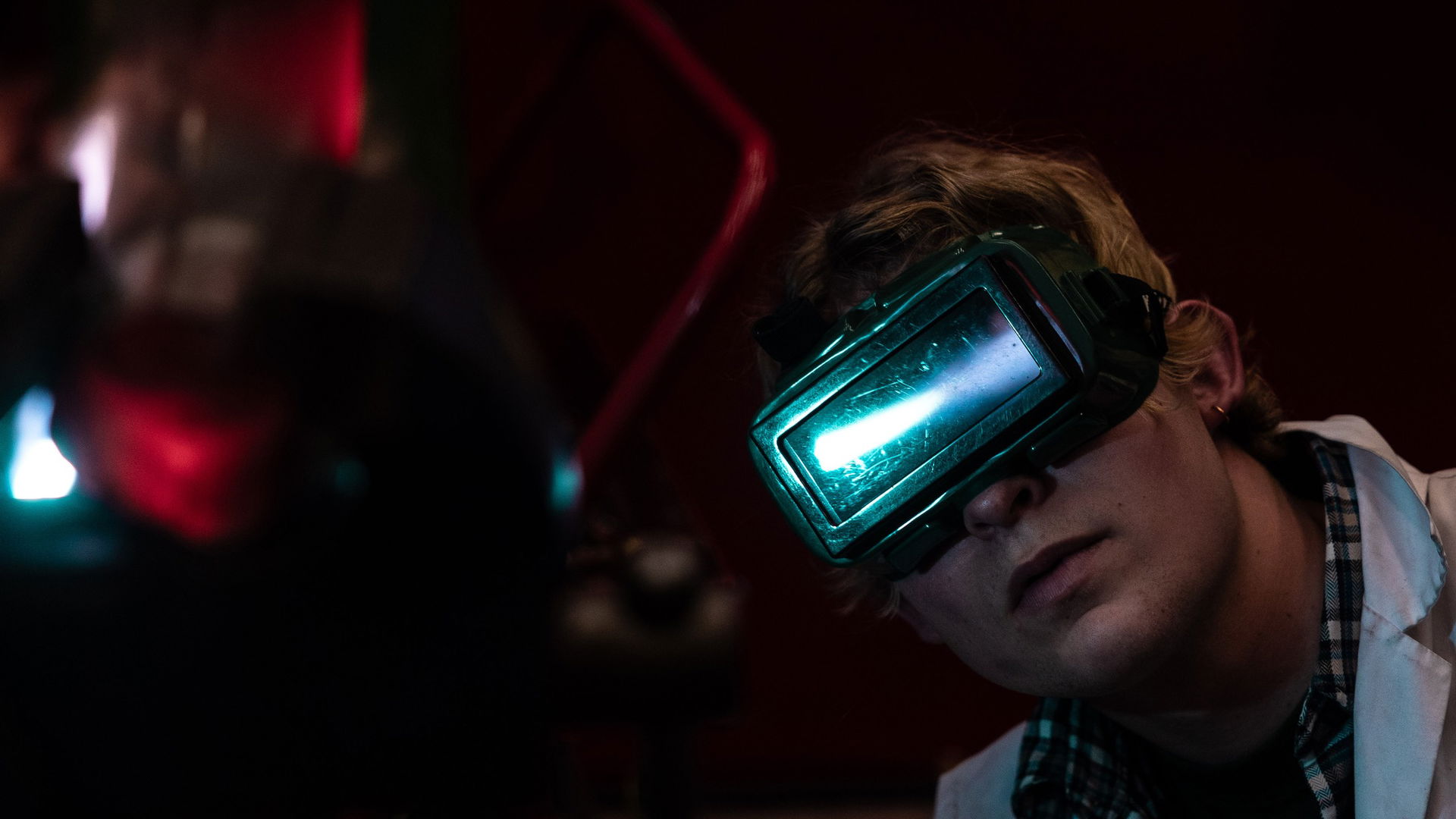 Alex Jennison works on his biodiesel-powered Harley