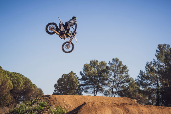 Husqvarna FC 450 performing a motocross jump