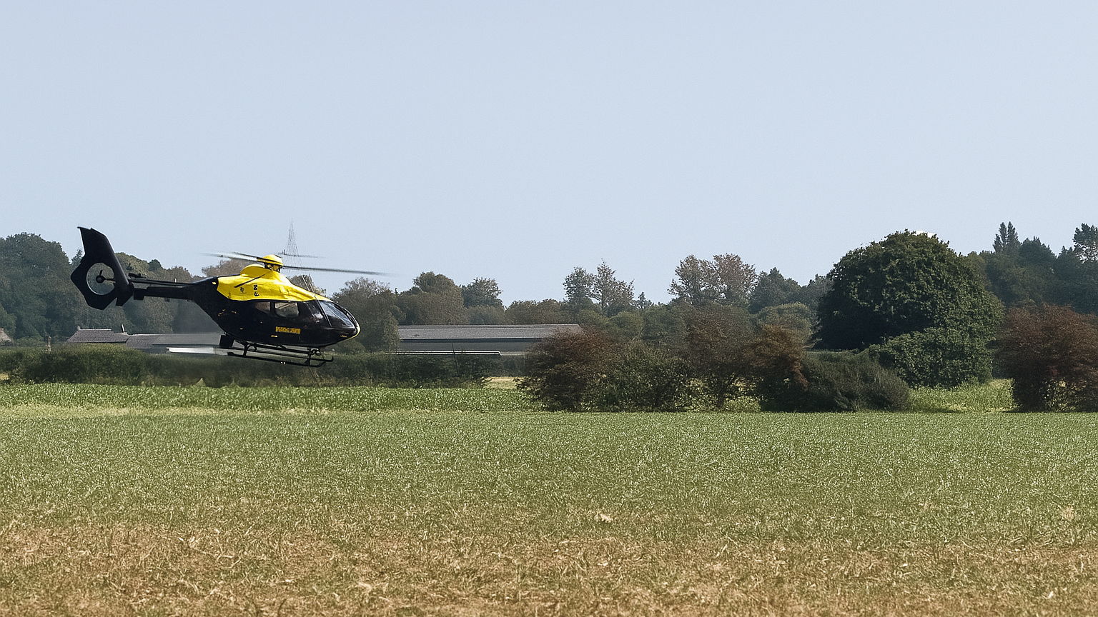 Police helicopter chasing biker