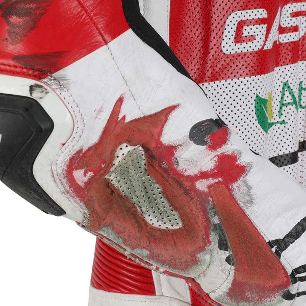 Jake Dixon-signed Alpinestars race suit from 2023. Photo credit - MotoGP Authentics