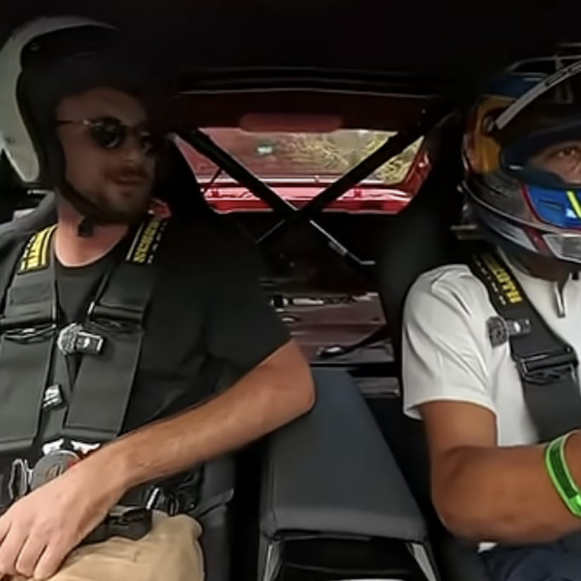 Toprak Razgatlioglu driving a BMW M2 at the Nurburgring Nordschleife circuit