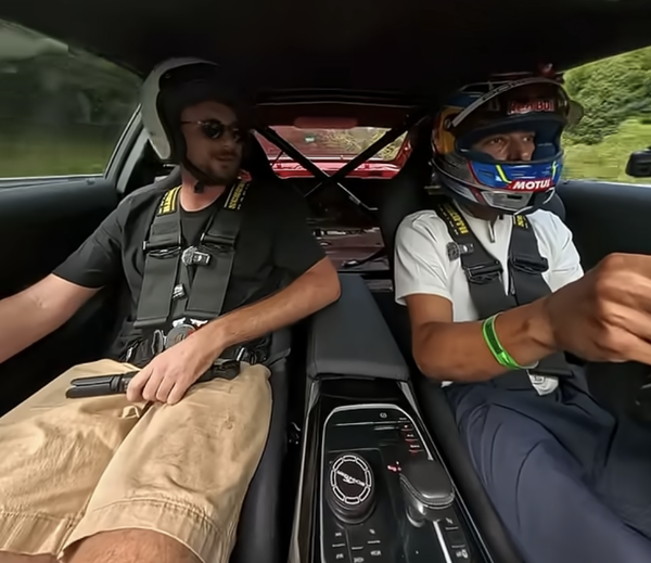 Toprak Razgatlioglu driving a BMW M2 at the Nurburgring Nordschleife circuit