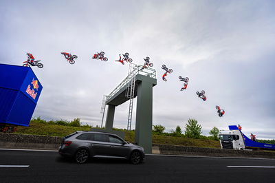 Luc Ackermann jumping a motorway hoarding - Predrag Vuckovic / Red Bull Content Pool