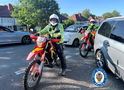 West Midlands Police officers on off-road motorcycles