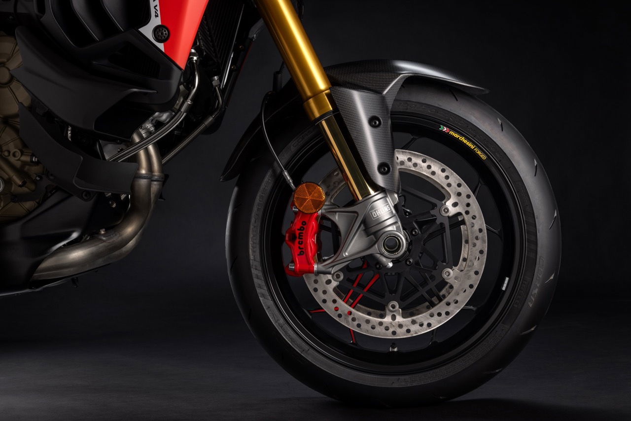 Top-spec Brembo Stylema calipers - which are red, obviously