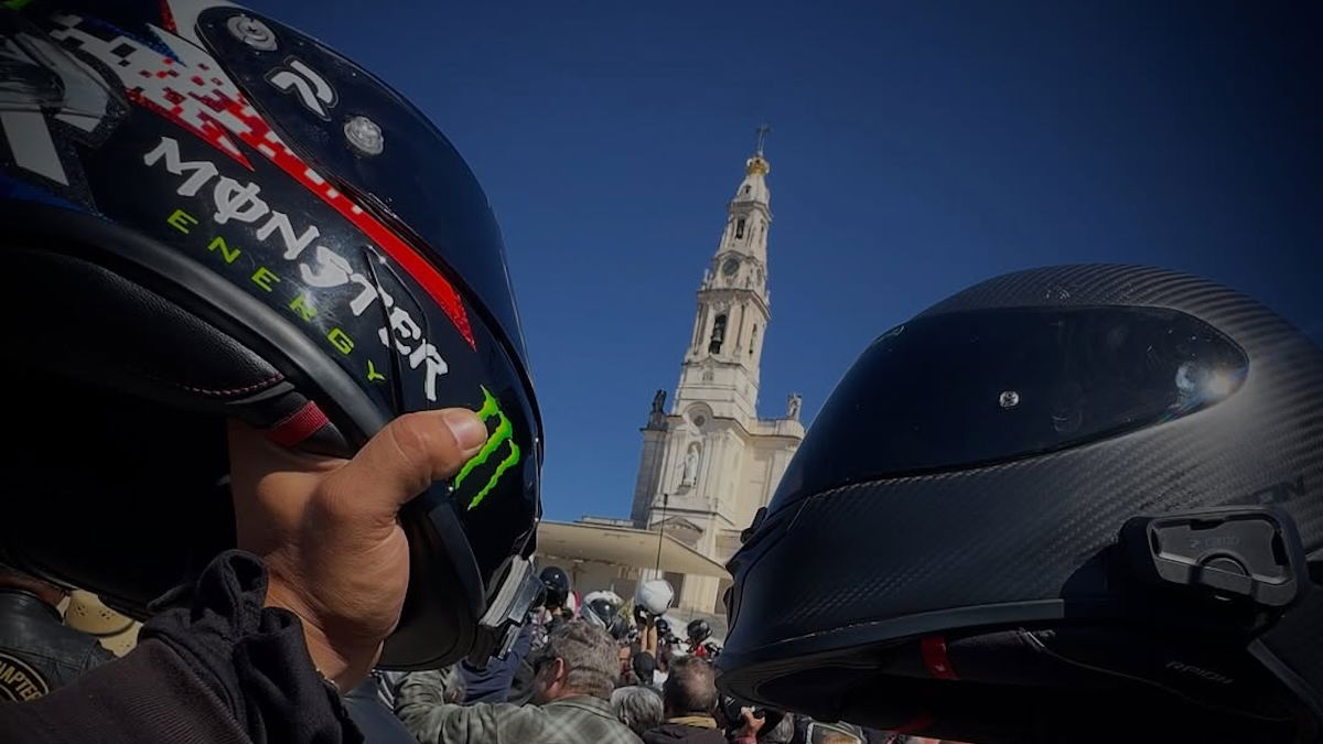 Helmets held aloft at the Blessing of the Helmets