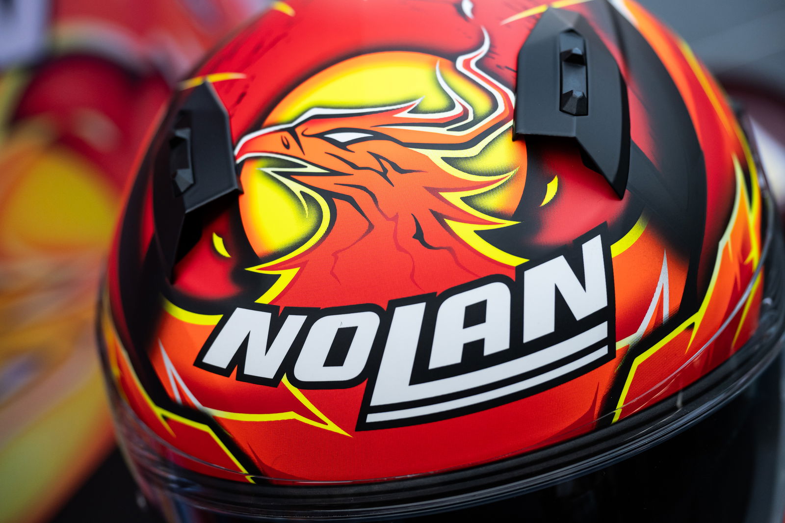 Nolan logo and Phoenix bird