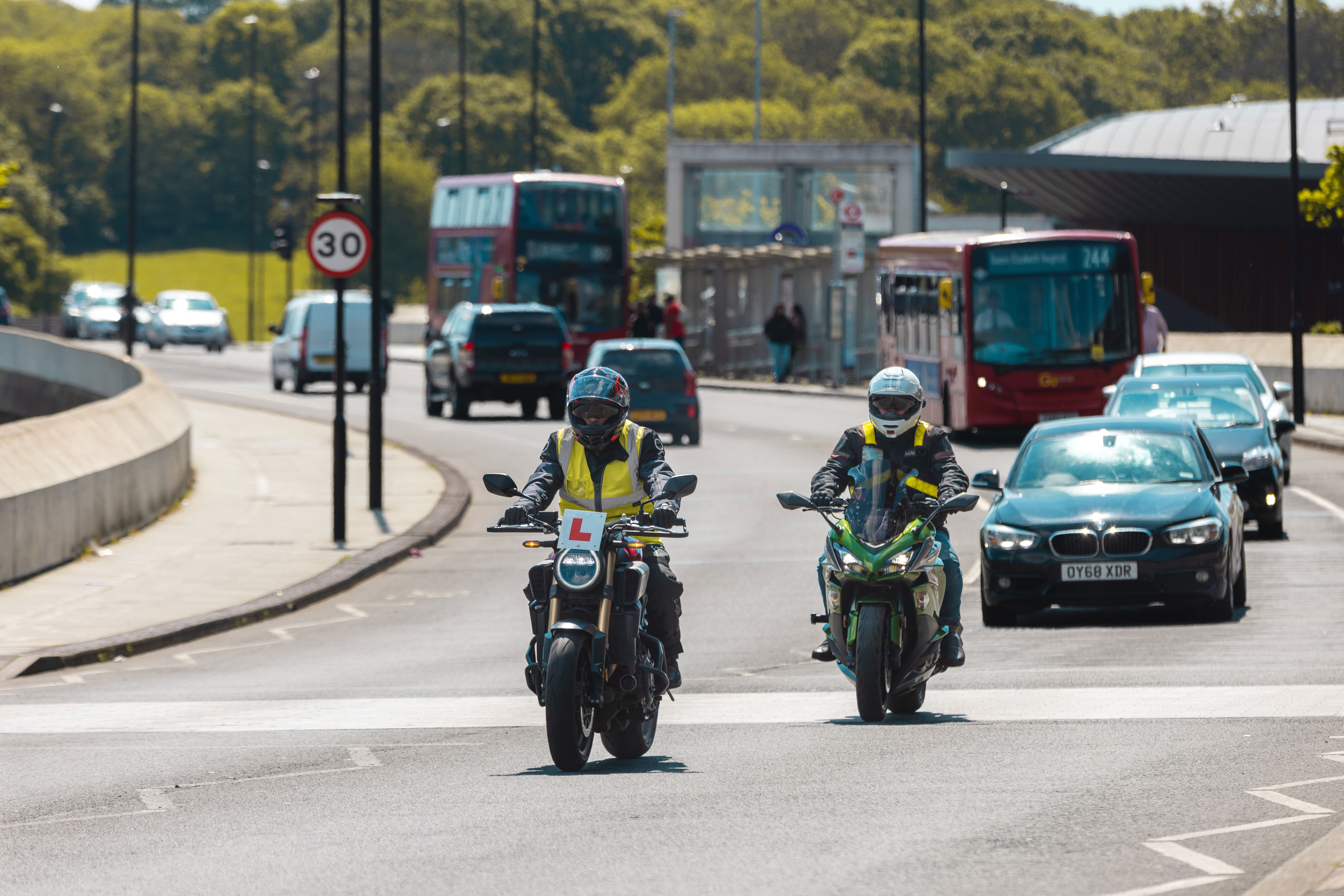 Motorcycle learner with an instructor
