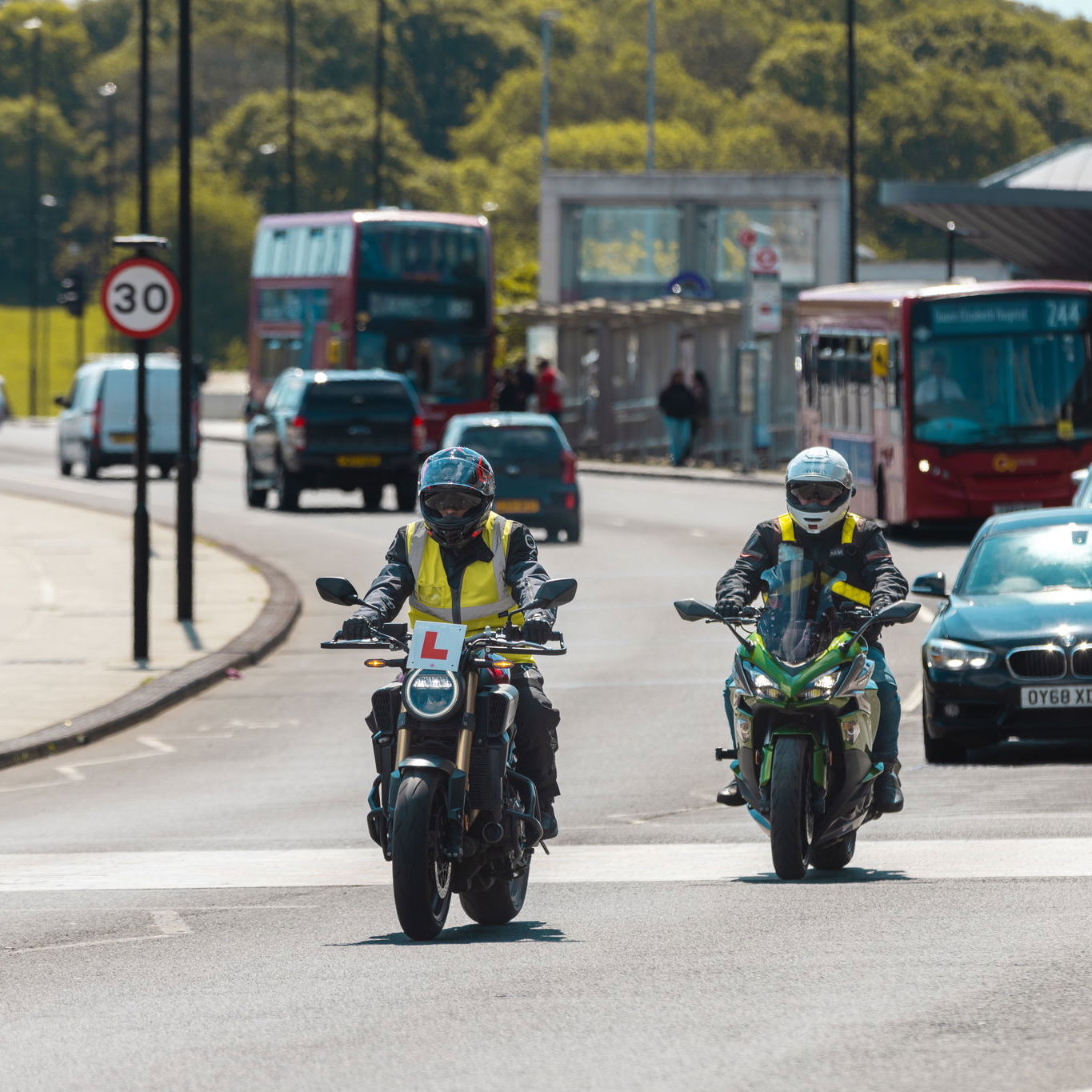 Motorcycle learner with an instructor