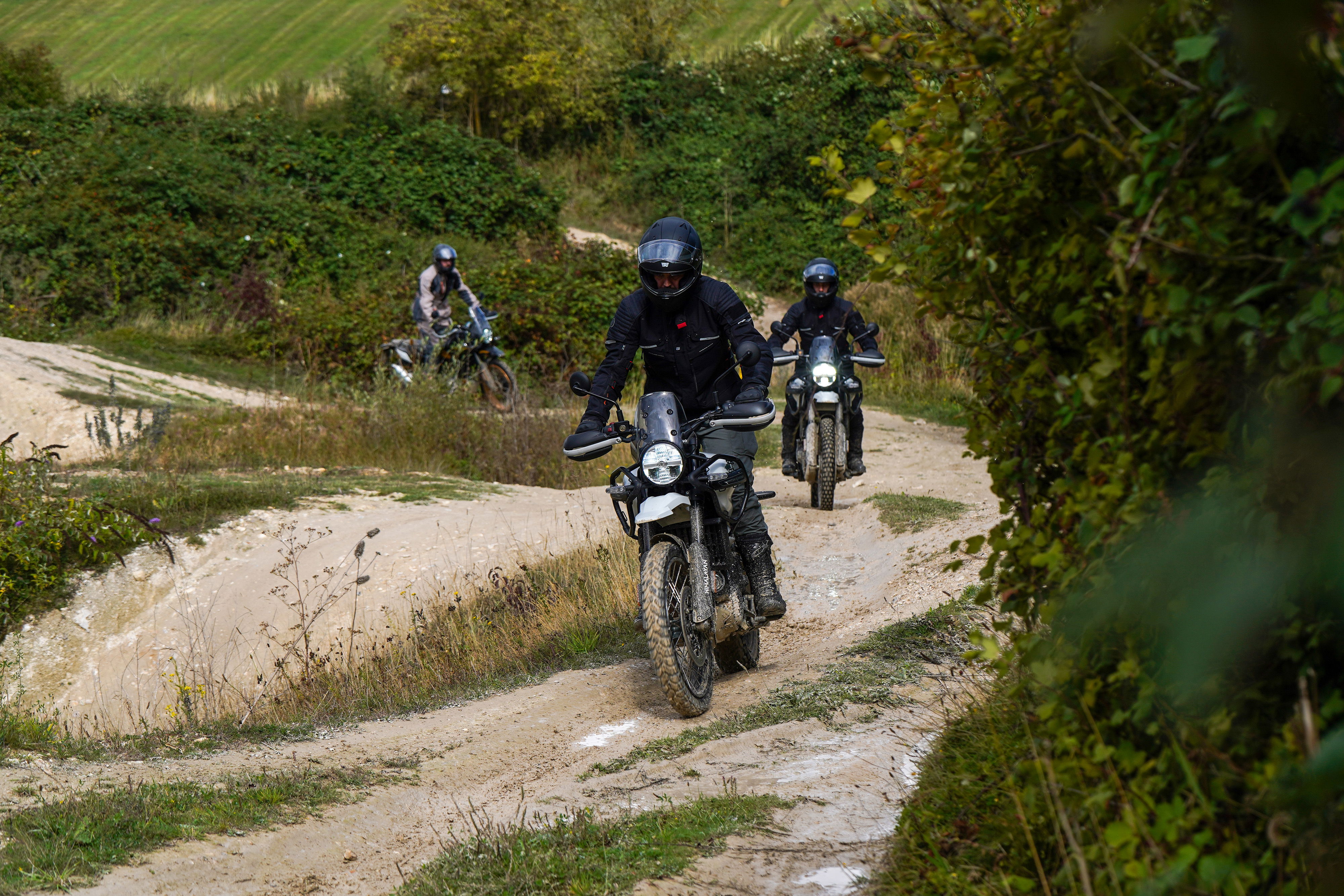 Royal Enfield Himalayan 450 bikes being ridden off-road