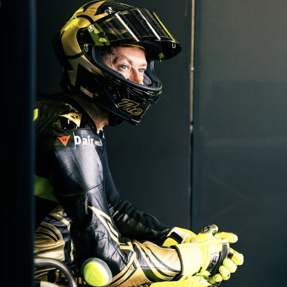 Valentino Rossi wearing the special VR46 anniversary leathers and helmet. Photo credit - UNICEF