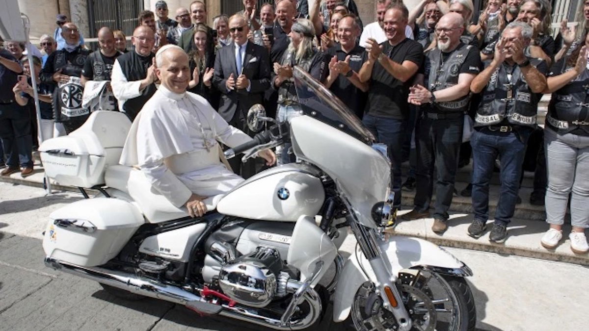 The Pope sitting on a BMW R18 Transcontinental