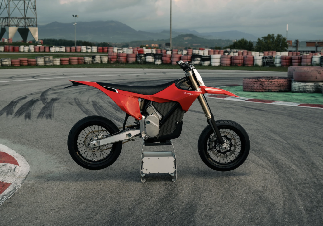 Red Stark Varg SM parked on a track