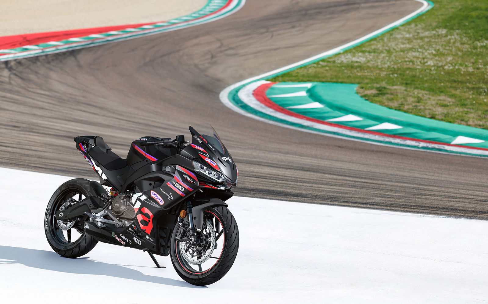 Aprilia's new RS457 GP parked on the side of a track