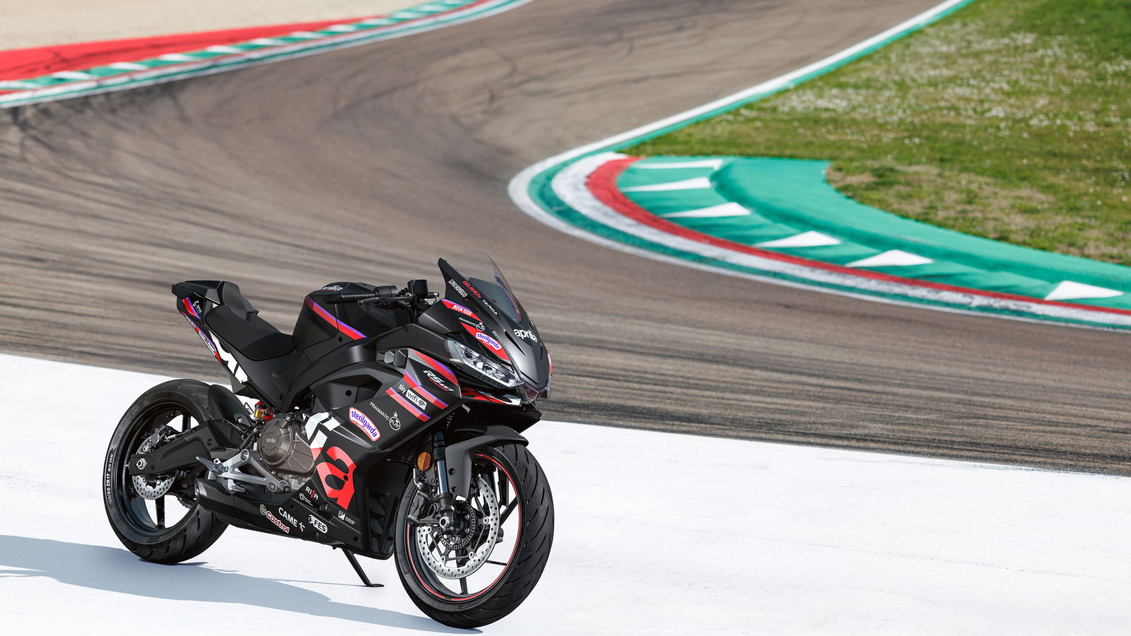 Aprilia's new RS457 GP parked on the side of a track