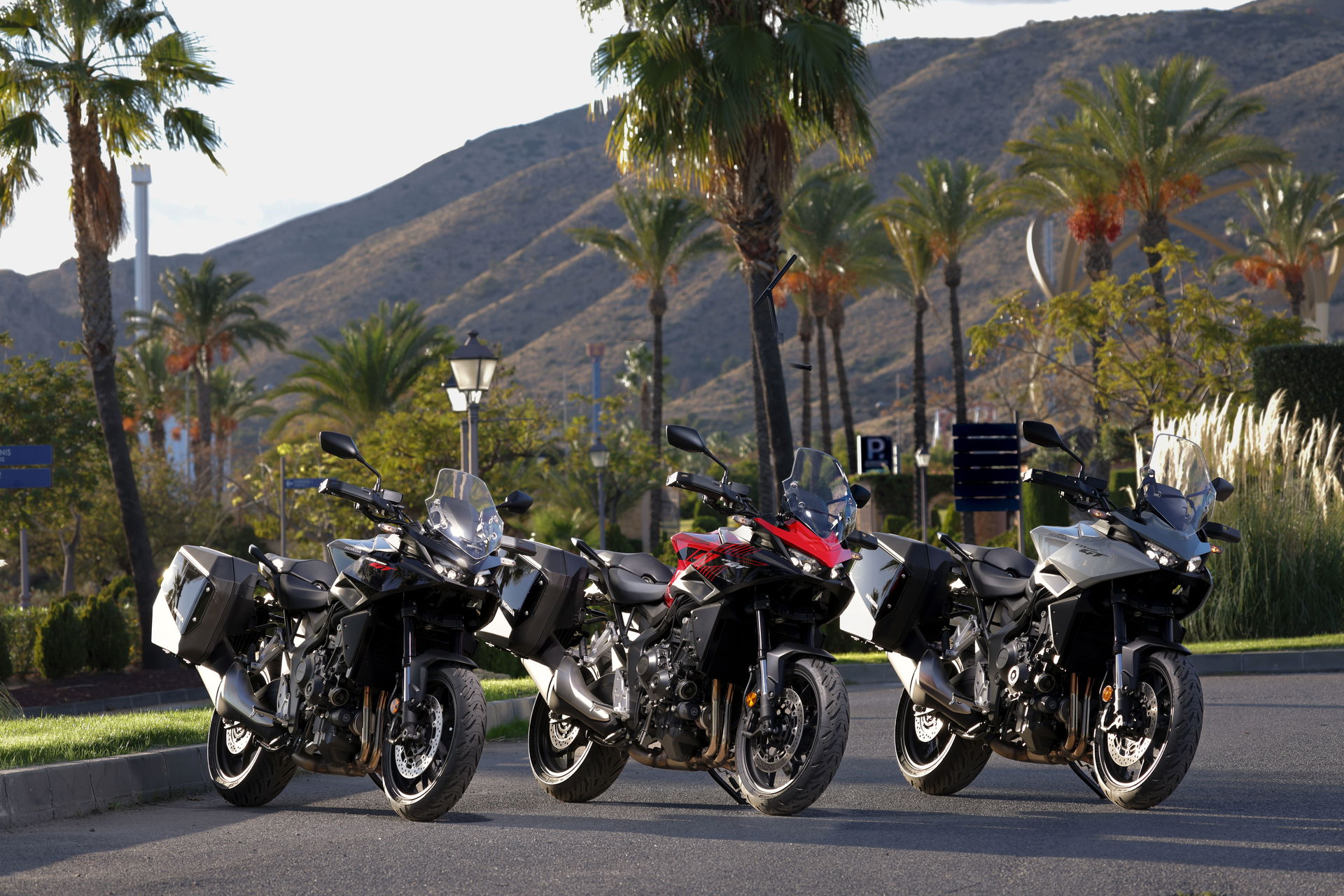 The Honda CB1000GT - (L to R) Graphite Black, Grand Prix Red, Pearl Deep Mud Gray
