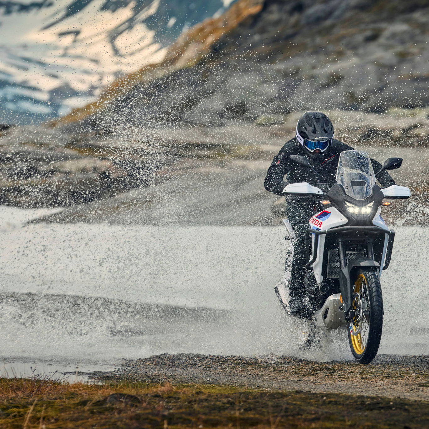 2026 Honda XL750 Transalp riding through water