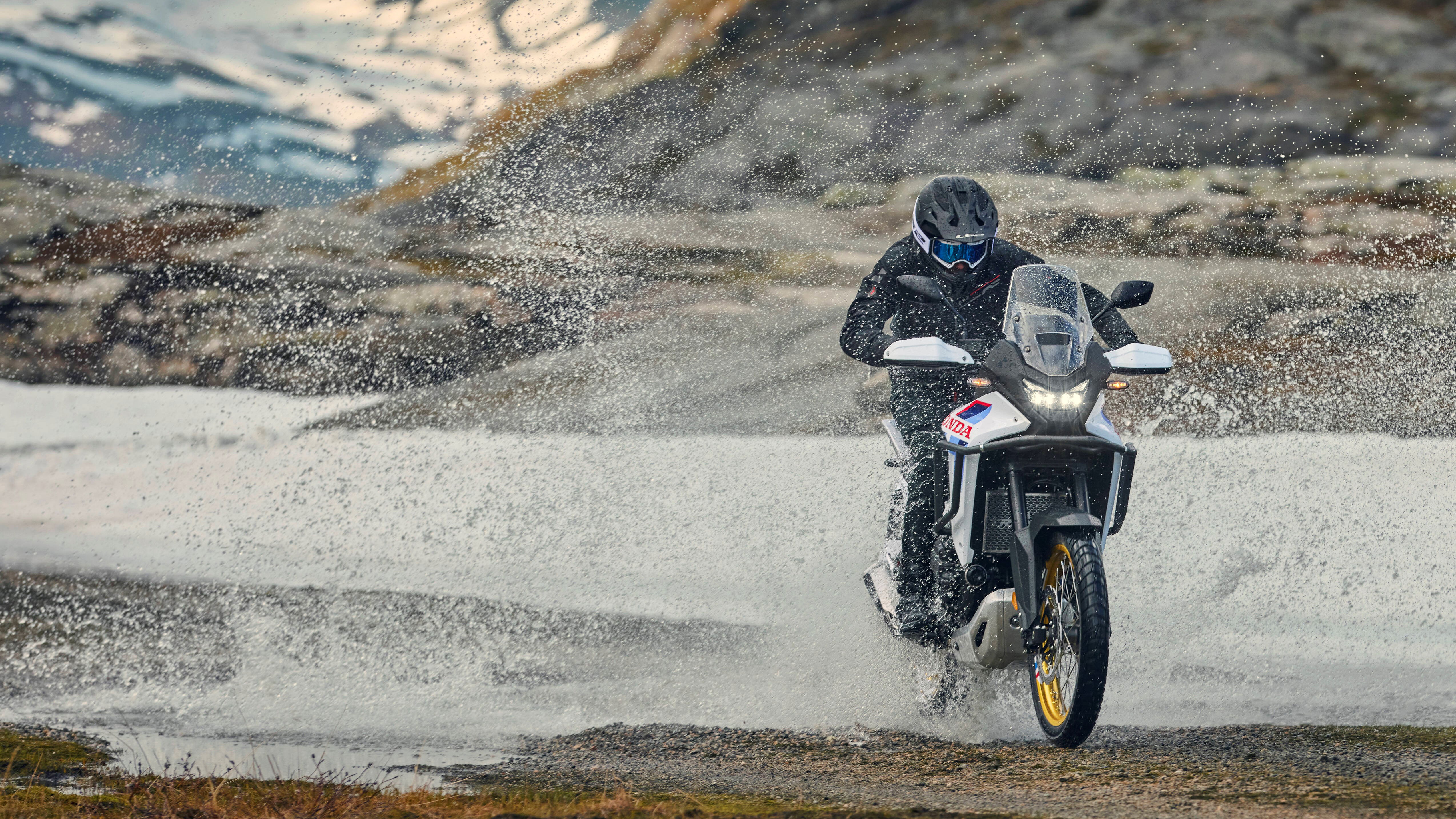 2026 Honda XL750 Transalp riding through water