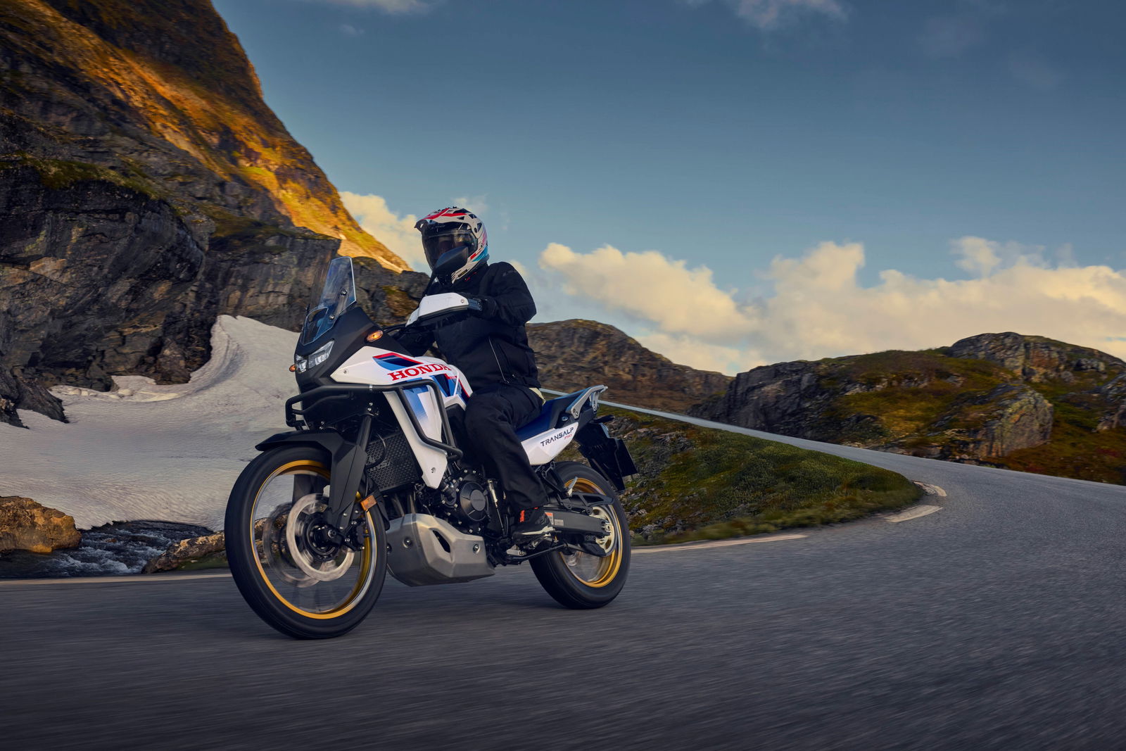 Honda XL750 Transalp riding on the road