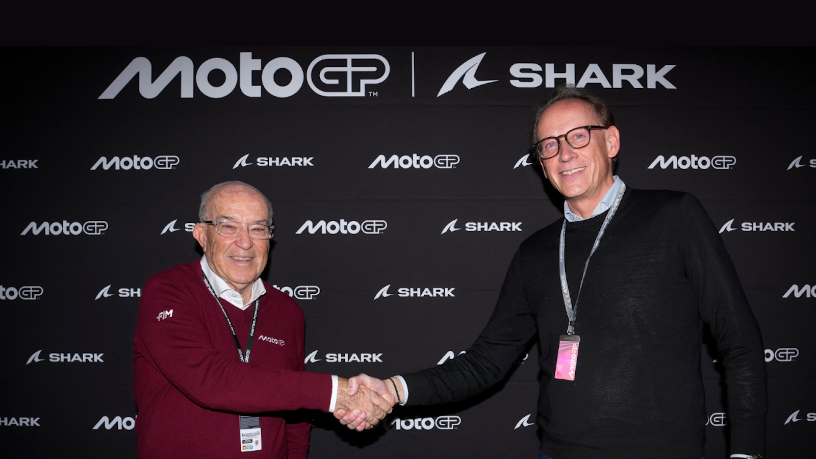Carmelo Ezpeleta , Dorna Sports (L) and Christophe Merkel, 2 Ride (R)